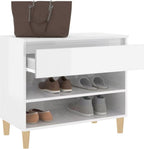 White MDF shoe rack cabinet with front drawer and two open shoe shelves; light wood legs.