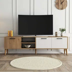 Light wood and white TV table with open media shelf and drawers; holds flat-screen TV