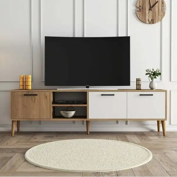 Light wood and white TV table with open media shelf and drawers; holds flat-screen TV