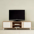 Light wood TV table with two white doors and central open shelves for media