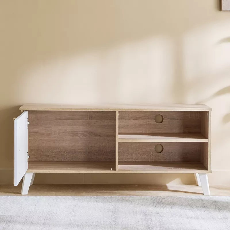 TV table in light wood with white side door and two open compartments, round pull knobs