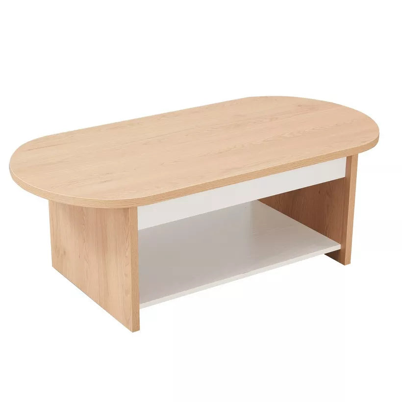 Light wood oval coffee table with white base panel and lower storage shelf.