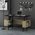 Rectangular office desk with black metal frame, dark tabletop, and light wood side shelves