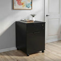 Black drawer cabinet unit with one drawer, one door, and casters