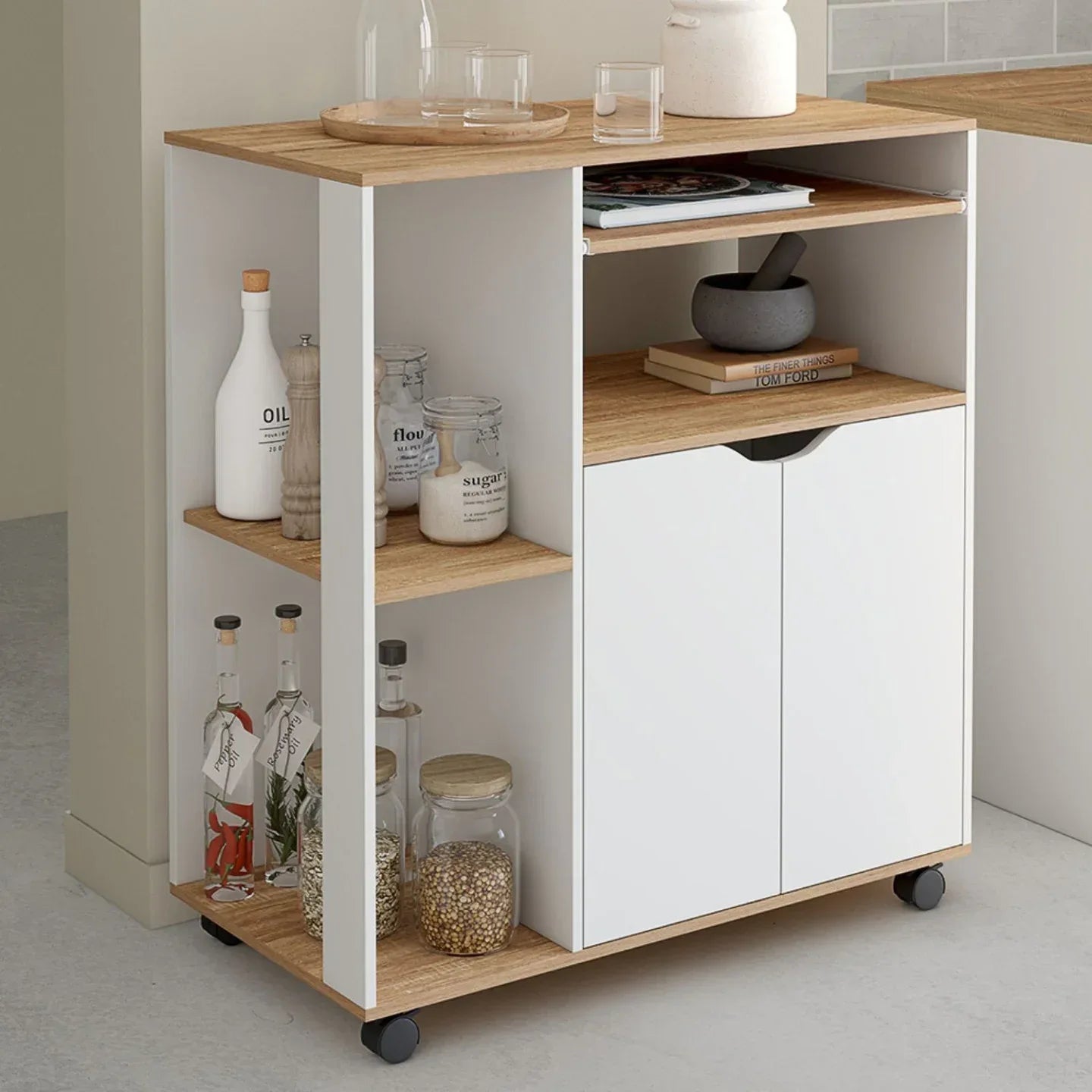 Coffee corner cabinet with oak-effect top, white doors, open shelves, and wheels
