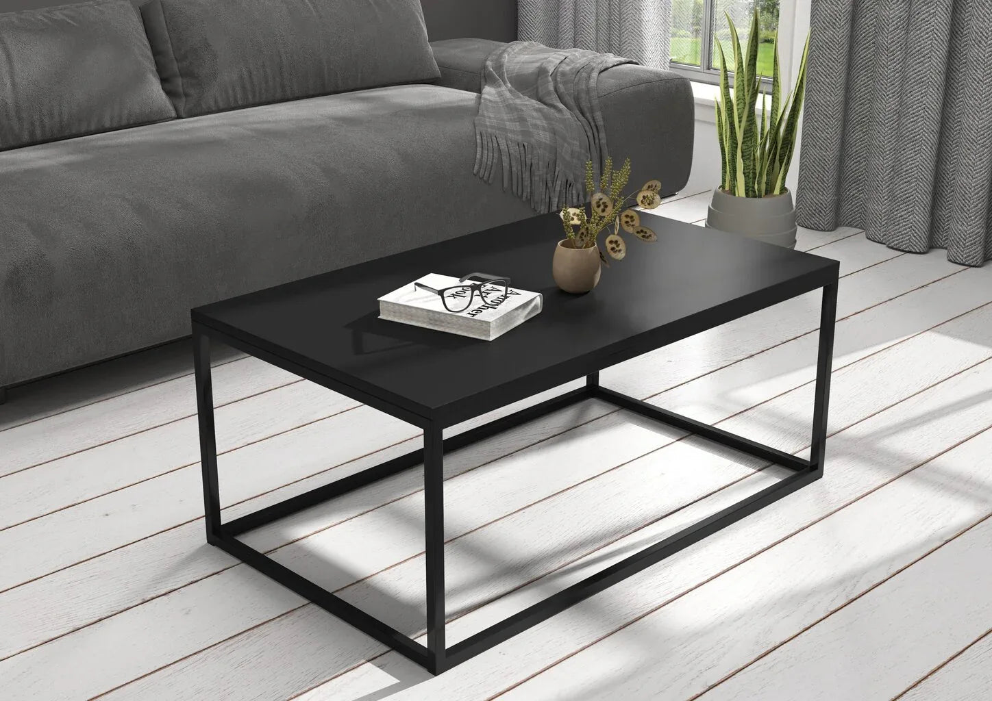 Rectangular coffee table with black MDF top and black metal cross-leg base