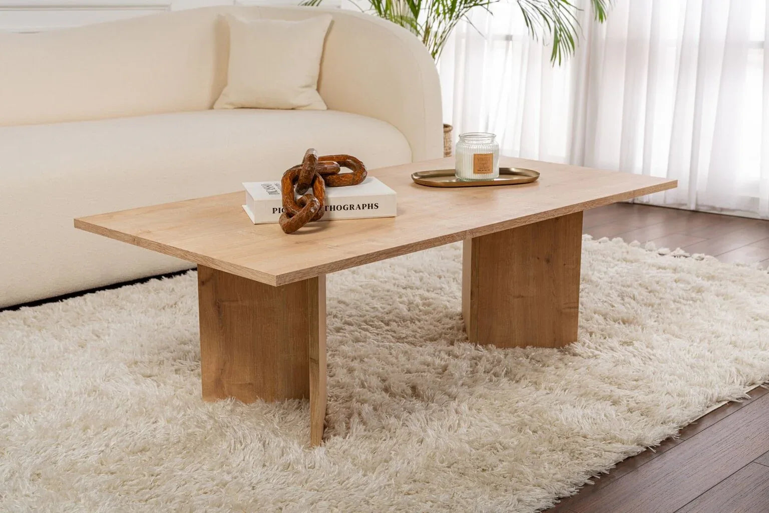 Daisy coffee table in light wood-tone MDF, rectangular top with tapered legs