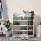 Open white shoe cabinet with multiple shelves and cubbies holding pairs of shoes
