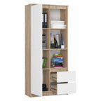 Tall bookcase in light wood with white drawer fronts and open book compartments