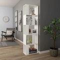 White MDF bookcase with open shelves and cubbies, tall cabinet with display compartments