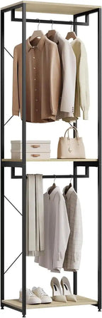 Freestanding clothes rack with dark metal frame, hanging rods, and MDF display shelves