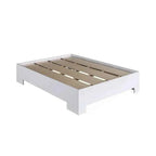 White MDF bed frame with visible wooden slat platform and low legs