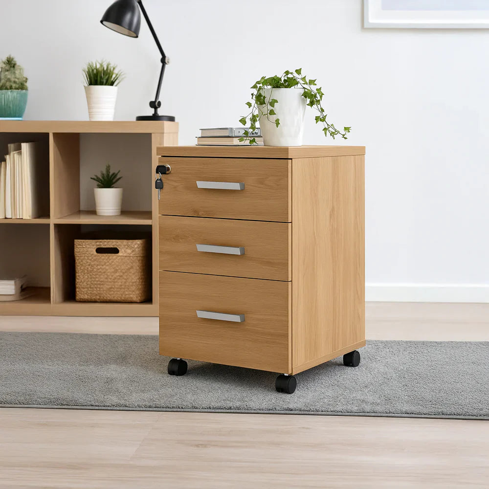 Light oak MDF 3-drawer unit with bar pulls on caster wheels