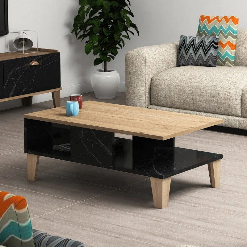Rectangular coffee table with light wood top and dark black MDF base, wooden legs