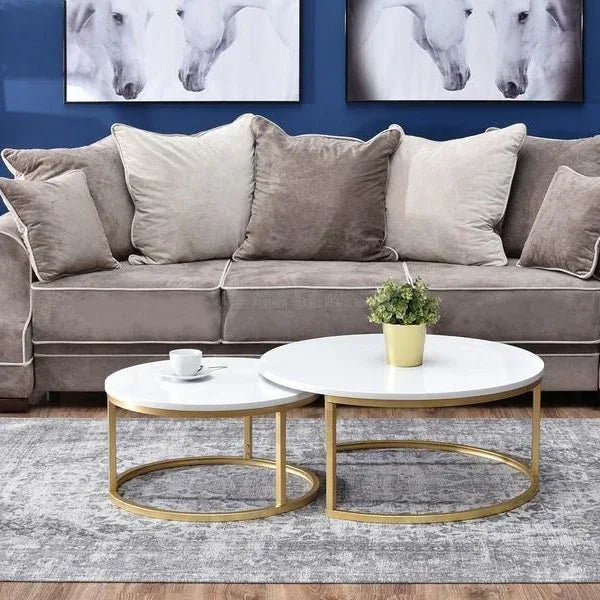 Round coffee table set with white MDF tops and gold metal nested bases