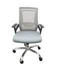 Grey office chair with mesh back, black armrests, chrome base and rolling casters