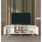 White TV console with open side cabinets showing shelves; tapered wooden legs