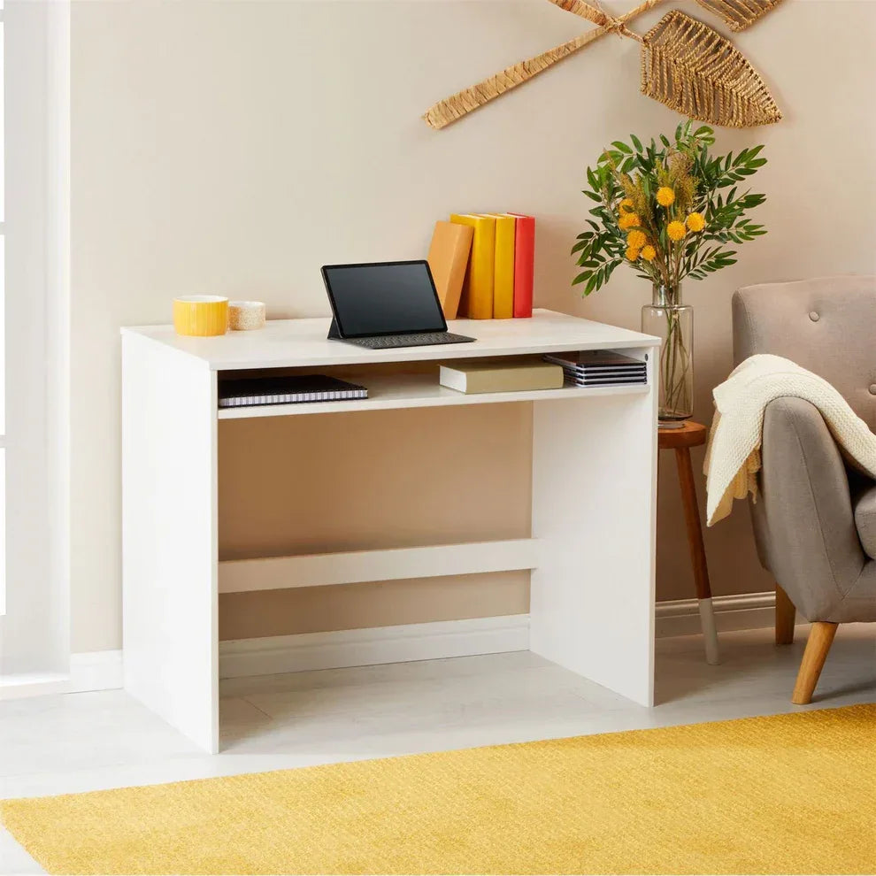 White desk with lower shelf and slotted storage under the worktop