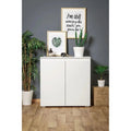 White MDF shoe cabinet with two panel doors and flat top, 90x40x100cm.