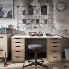 Light wood MDF desk with two drawer cabinets, open center, and chair