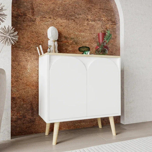 White MDF coffee corner cabinet, two-door arched top, light wood legs