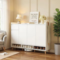 White MDF shoe cabinet with hinged doors and open shoe storage at bottom