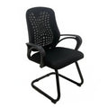 Black side chair with patterned mesh back, padded seat, and sled base with armrests