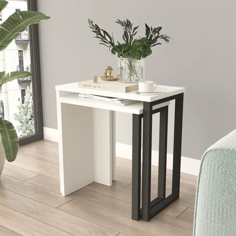 White MDF side table with black metal legs, rectangular top and open frame base.