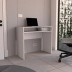 White MDF desk with open shelf, cable cutout, and keyboard tray area under monitor