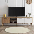 Wood and white TV media console table with open shelf, drawers, and mid-century legs