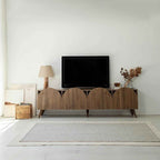 BERNICE TV table with arched front panels, dark wood finish, tapered legs