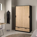 Wood-effect MDF wardrobe with 2 drawers and hinged door, black frame, front view