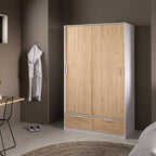 MDF wardrobe with light wood-effect front, two lower drawers, closed door front view