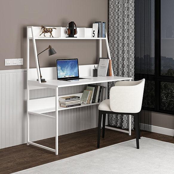 Desk with white top and white metal frame, open shelves and cubbies