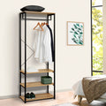 Black metal clothes stand with MDF shelves and hanging bar, open storage levels
