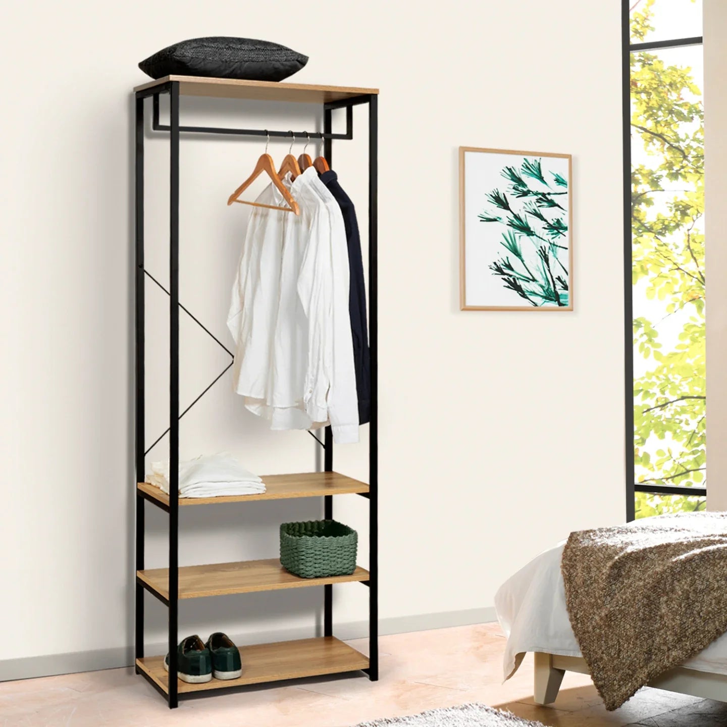 Black metal clothes stand with MDF shelves and hanging bar, open storage levels