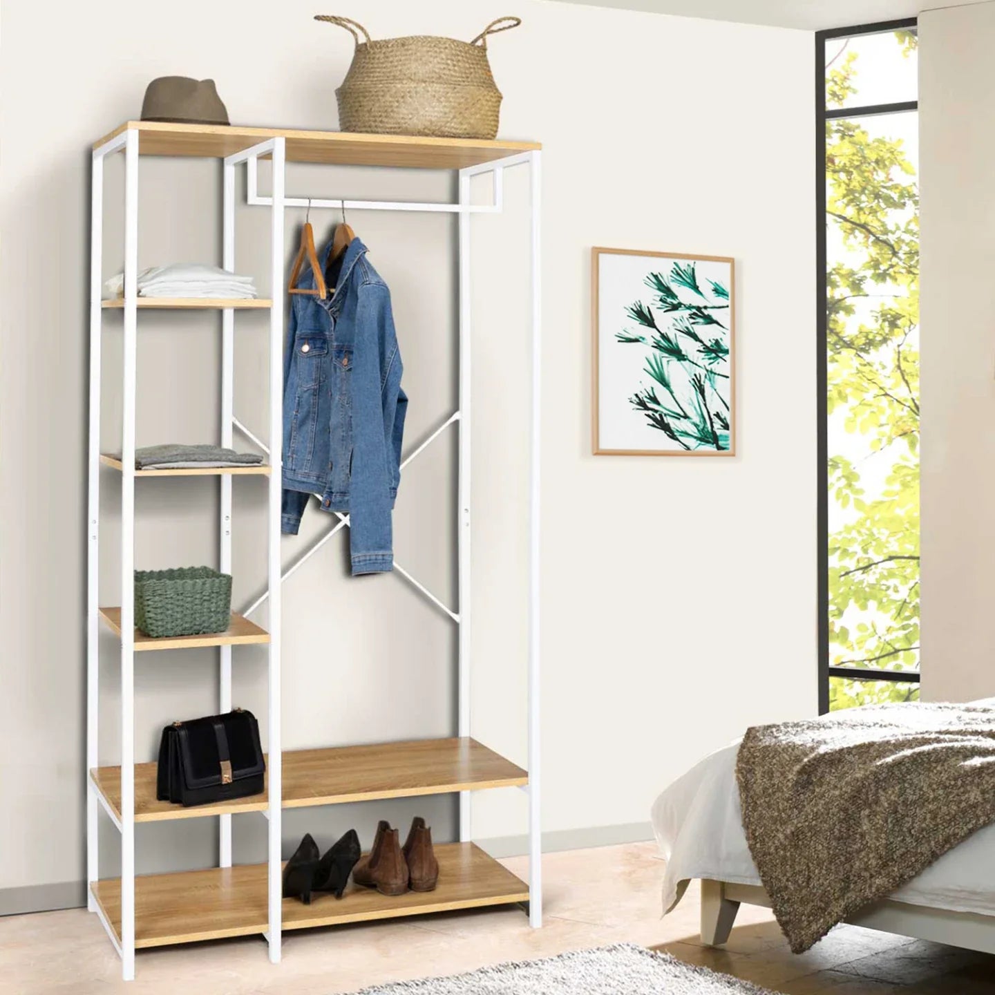 Clothes stand with white metal frame, light-wood shelves, hanging denim jacket and bags