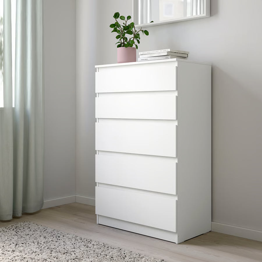 White MDF dresser with four stacked drawers, front view