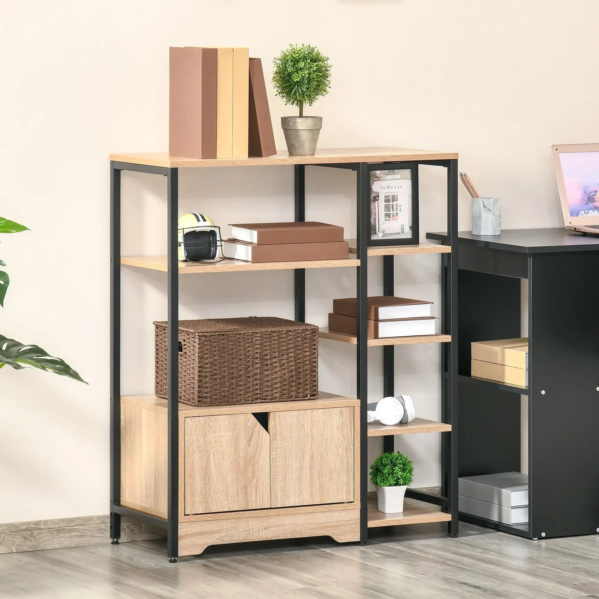 Light wood and black metal bookcase with open shelves and lower cabinet with doors