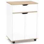 Wood tabletop over white cabinet doors with black curved drawer handle and caster wheels