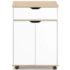 White cabinet with wood top and two doors, upper drawer with black curved cutout handle