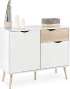 White and oak-tone coffee corner cabinet with two doors and two drawers on wooden legs
