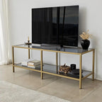 Black TV table with gold metal frame, glass shelf and open storage for media