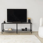 Black MDF TV stand with flat top and two open compartments beneath