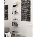 White narrow bookcase with 5 open shelves and small lower storage cubby